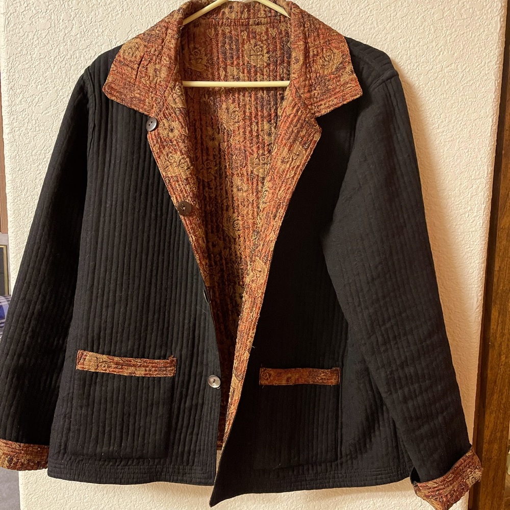 Quilted black and rust REVERSIBLE jacket size Large.